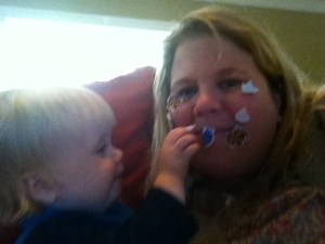 Deciding mommy makes a better sticker page than the book.