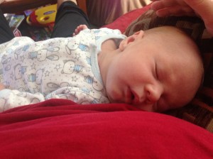 Another typical day at home. Content, well-fed baby resting with mommy. 